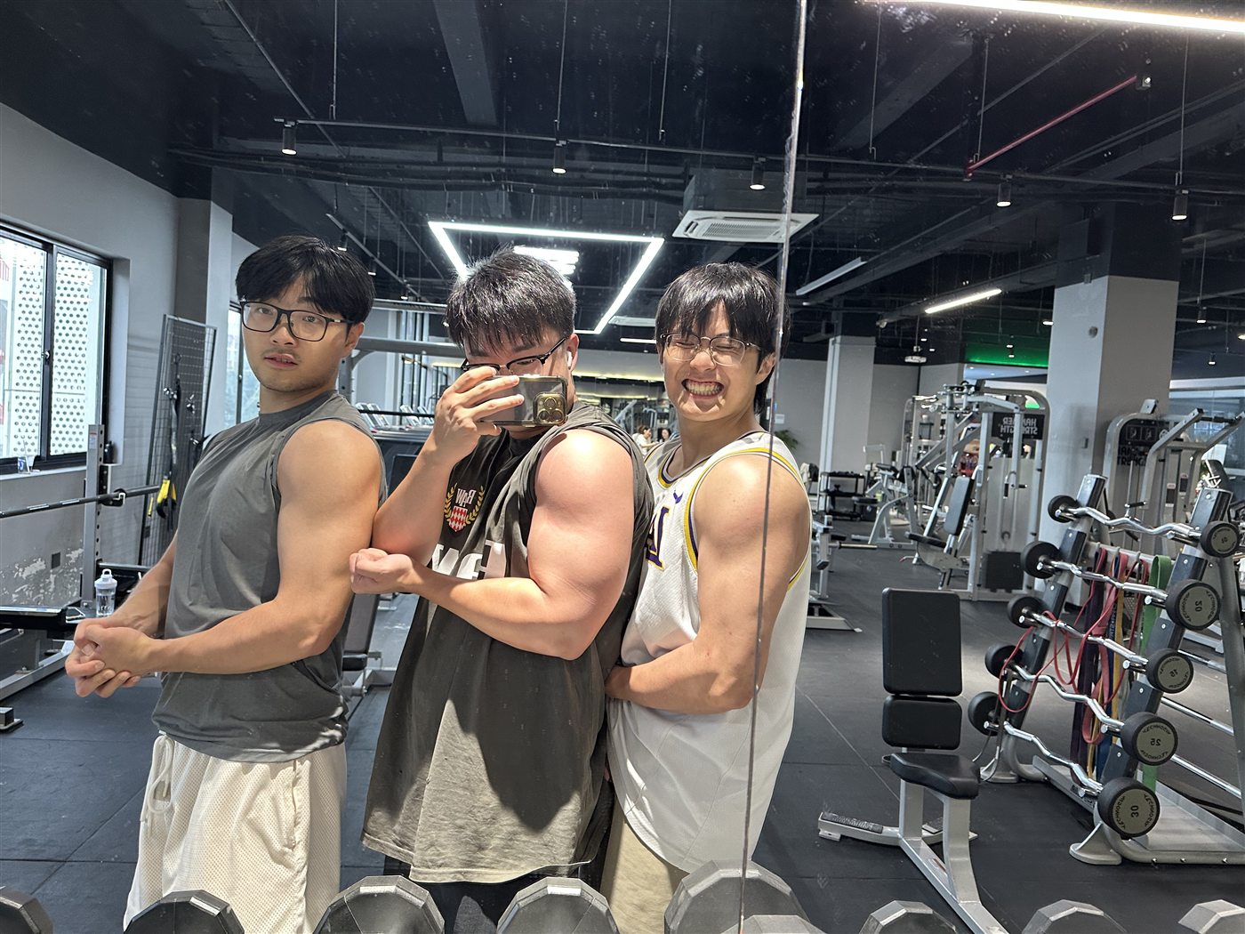 Arm day mirror photo with friends